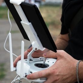 man-operator-is-holding-control-panel-drone-with-tablet (1)